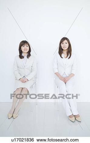 Stock Photograph - Portrait of businesswomen. Fotosearch