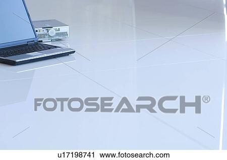 Stock Image - Projector and laptop. Fotosearch