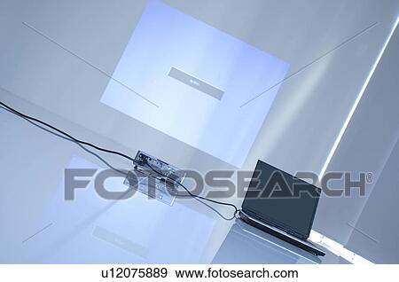 Stock Photo - Projector and laptop. Fotosearch