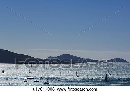 Stock Photo - Sailboats at sea. Fotosearch
