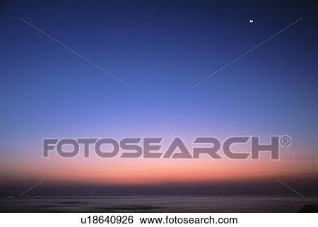 Stock Photograph - Scenic view at sunset. Fotosearch