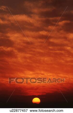 Setting sun View Large Photo Image Stock Photo - Setting sun. Fotosearch