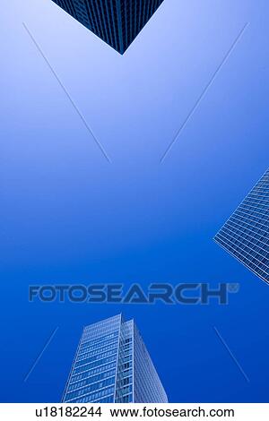 Skyscrapers and blue sky View Large Photo Image Picture - Skyscrapers and blue sky. Fotosearch