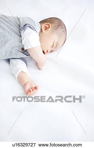 Sleeping baby boy View Large Photo Image Stock Photo - Sleeping baby boy. Fotosearch
