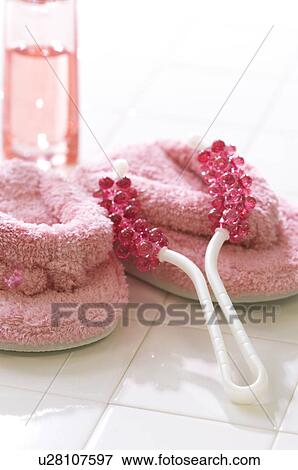 Slippers and a massaging tool View Large Photo Image Stock Photo - Slippers and a massaging tool. Fotosearch