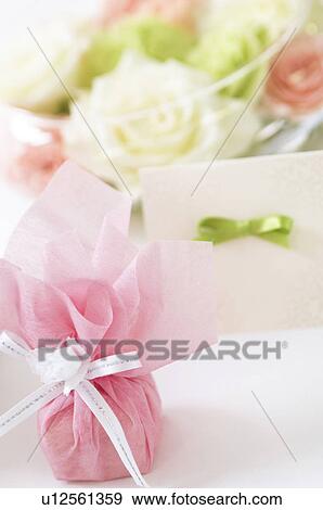 Small gift and note card View Large Photo Image Stock Photo - Small gift and note card. Fotosearch