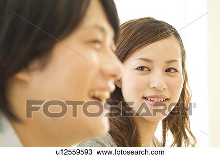 Stock Image - Smiling couple. Fotosearch