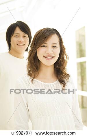 Stock Image - Smiling couple. Fotosearch