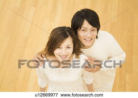 Smiling couple View Large Photo Image Stock Photo - Smiling couple. Fotosearch
