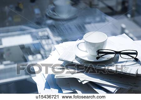 Spectacles on a stack of documents View Large Photo Image Stock Image - Spectacles on a stack of documents. Fotosearch