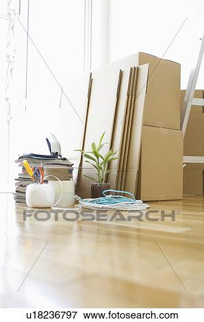 Stock Photo - Stack of cardboard boxes and packaging items. Fotosearch