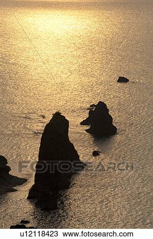 Steep cliff in ocean View Large Photo Image Stock Image - Steep cliff in ocean. Fotosearch