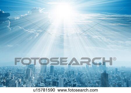 Stock Image - Sun shining on cityscape. Fotosearch