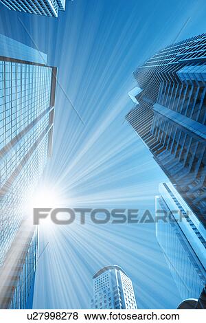 Sun shining on skyscrapers View Large Photo Image Stock Photo - Sun shining on skyscrapers. Fotosearch