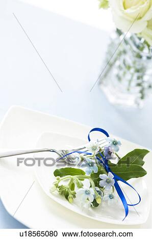 Table setting with flowers and blue ribbon View Large Photo Image Stock Image - Table setting with flowers and blue ribbon. Fotosearch