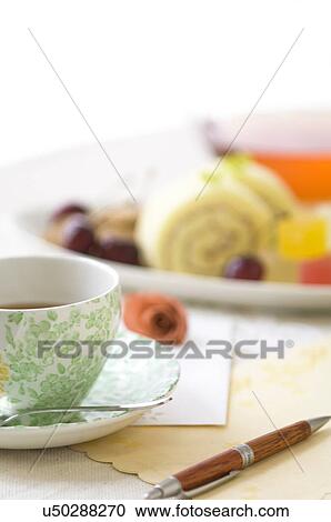 Tea cup on table setting View Large Photo Image Stock Image - Tea cup on table setting. Fotosearch
