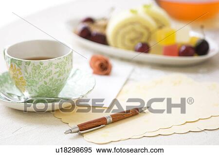 Tea cup on table setting View Large Photo Image Stock Photography - Tea cup on table setting. Fotosearch