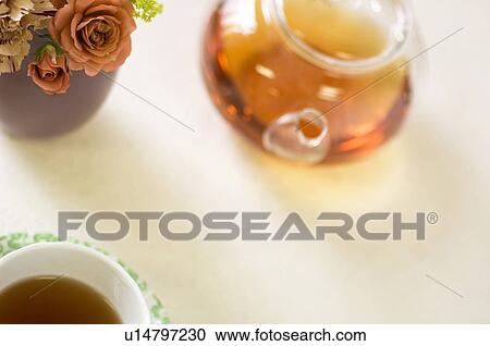Stock Image - Tea on table setting. Fotosearch