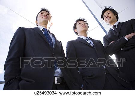 Picture - Three businessmen. Fotosearch