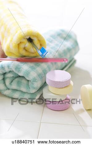 Towels, toothbrushes, and bath salts View Large Photo Image Stock Image - Towels, toothbrushes, and bath salts. Fotosearch