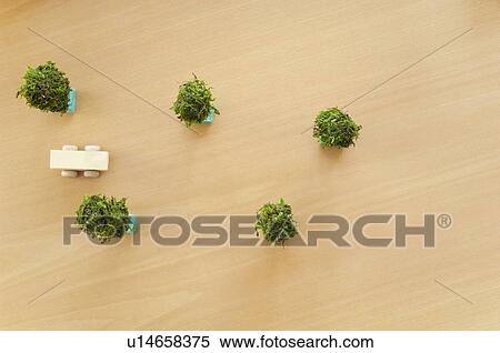 Stock Photography - Toy car and model trees. Fotosearch
