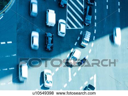 Stock Photo - Traffic on urban street. Fotosearch