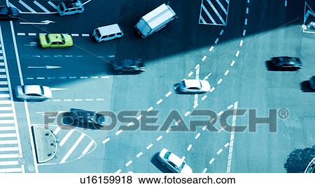 Stock Photo - Traffic on urban street. Fotosearch