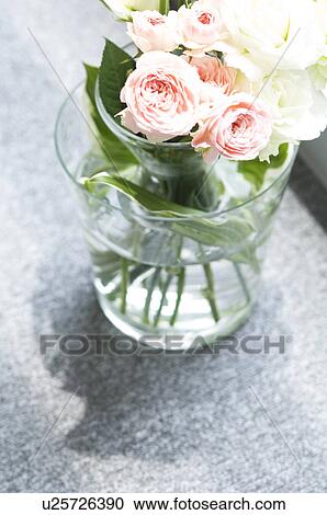 Stock Image - Vase of pink roses. Fotosearch