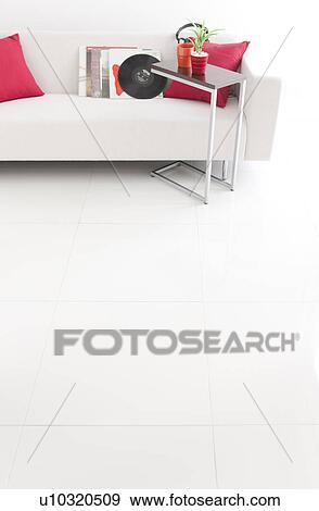 Stock Photo - Vinyl records and headphones on a sofa. Fotosearch