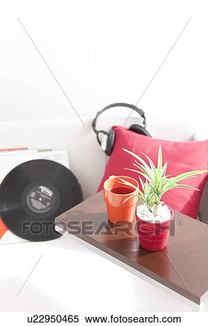 Stock Photography - Vinyl records and headphones on a sofa. Fotosearch
