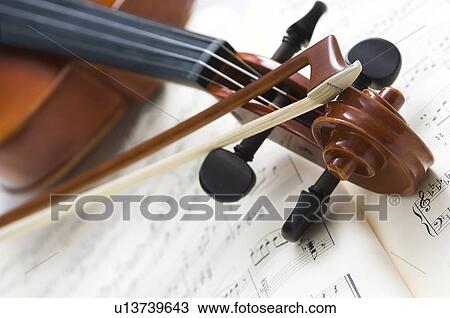 Stock Image - Violin and sheet music. Fotosearch