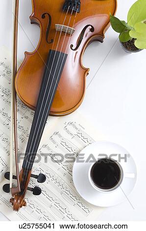 Violin, sheet music and a coffee cup View Large Photo Image Stock Image - Violin, sheet music and a coffee cup. Fotosearch