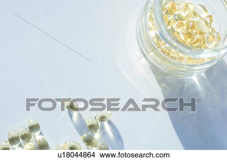 Picture - Vitamin capsules. Fotosearch