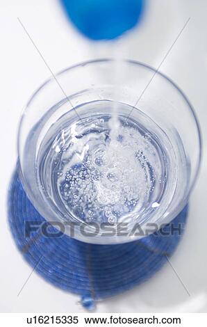 Water being poured into glass View Large Photo Image Stock Photography - Water being poured into glass. Fotosearch
