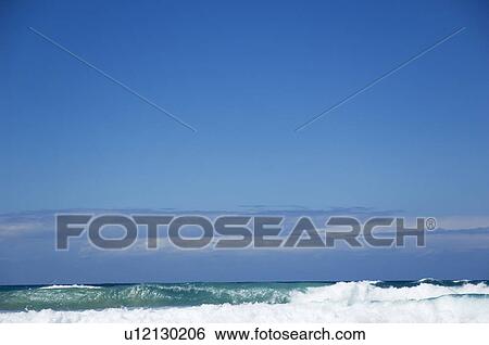 Waves crashing at sea View Large Photo Image Stock Photograph - Waves crashing at sea. Fotosearch