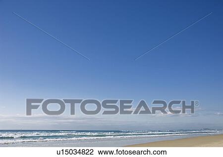 Waves lapping on beach View Large Photo Image Stock Image - Waves lapping on beach. Fotosearch