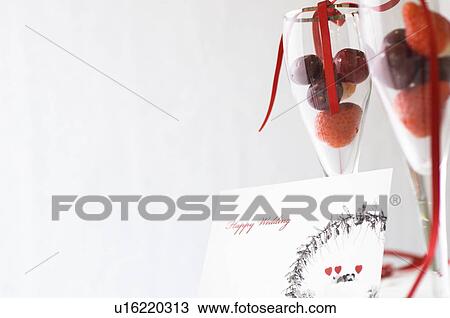 Wedding card and fruit in glasses View Large Photo Image Stock Image - Wedding card and fruit in glasses. Fotosearch