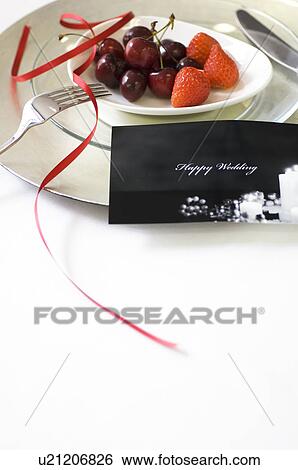 Stock Photograph - Wedding card and fruit. Fotosearch
