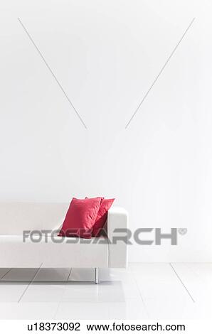 White sofa with two pink cushions View Large Photo Image Stock Image - White sofa with two pink cushions. Fotosearch