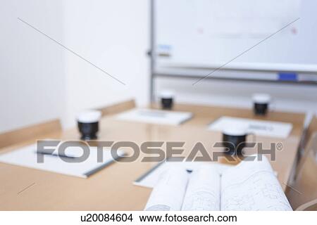 Picture - Whiteboard and table in empty board room. Fotosearch
