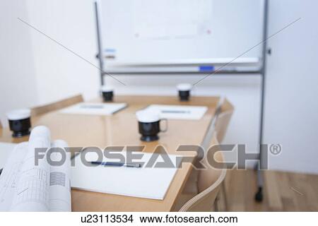 Picture - Whiteboard and table in empty board room. Fotosearch