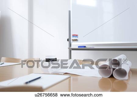 Stock Photo - Whiteboard and table in empty board room. Fotosearch