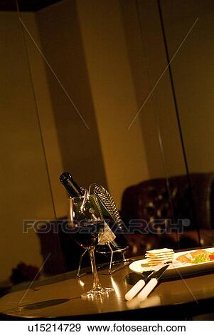 Wineglass on a table View Large Photo Image Stock Photo - Wineglass on a table. Fotosearch