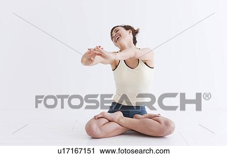 Woman doing Yoga View Large Photo Image Stock Image - Woman doing Yoga. Fotosearch