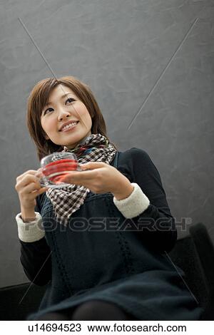 Woman drinking tea View Large Photo Image Stock Image - Woman drinking tea. Fotosearch