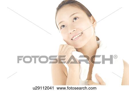 Woman holding towel after bath View Large Photo Image Stock Image - Woman holding towel after bath. Fotosearch