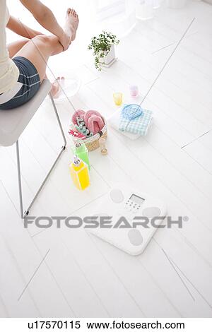 Stock Photography - Woman pampering her feet. Fotosearch
