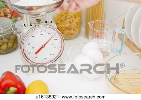 Woman preparing meal View Large Photo Image Stock Image - Woman preparing meal. Fotosearch