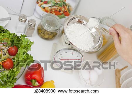 Woman preparing meal View Large Photo Image Stock Image - Woman preparing meal. Fotosearch