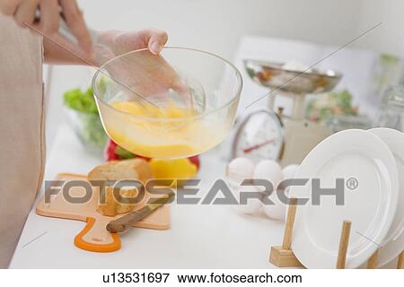 Woman preparing meal View Large Photo Image Stock Photo - Woman preparing meal. Fotosearch